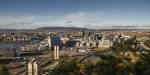 The centre of Oslo seen from the Ekeberg hillside with Bjørvika and Barcode in the foreground.