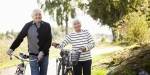 Older couple with bikes.