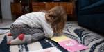 Girl draws on the floor