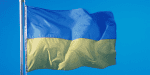 a ukrainian flag blowing in the wind