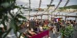 Birds view of people eating in an outdoor space.