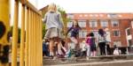 Children playing outside elementary school