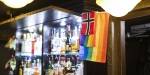 Rainbow flags and the Norwegian flag at London Bar. Photo: Benjamin A. Ward.