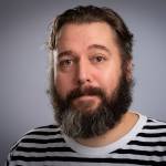 portrettbilde av Ole Andreas Danielsen som ser i kamera og smiler