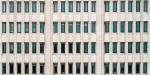An office building with many windows.