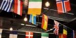 Lots of different flags hanging from the ceiling. Photo: Benjamin A. Ward