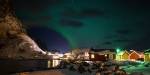 Aurora borealis over a small community in Northern Norway.