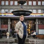 Olaug in front of the large fountain at Youngstorget. Photo: Benjamin A. Ward.